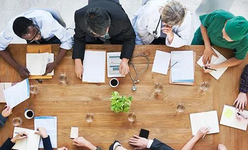 People in a hospital discussing