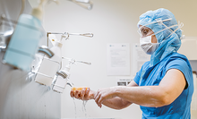 Healthcare worker washing hands